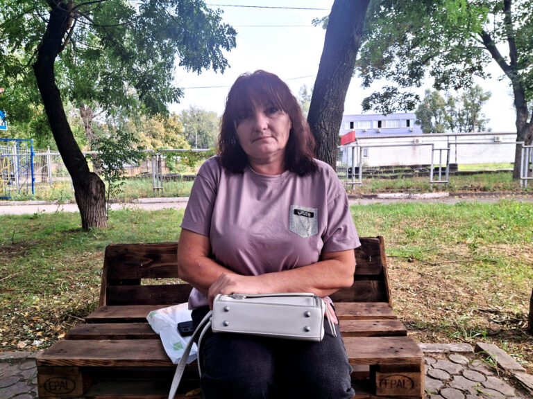 8. Iryna Shovkoplyas in front of the community centre in Vasylyvka, 1 September 2024